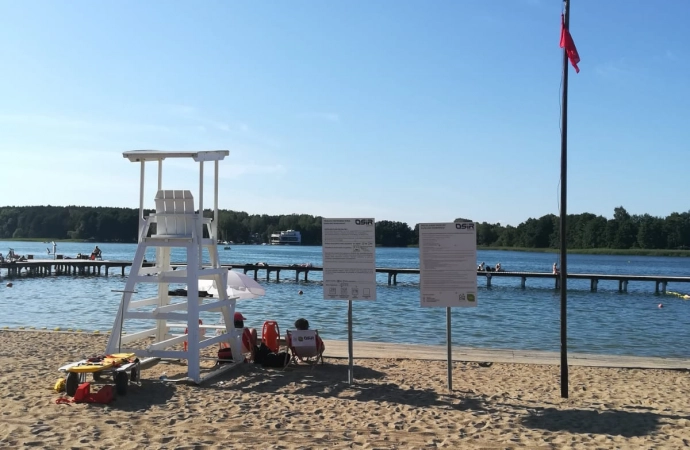 {Zaledwie kilka dni po odwołaniu, wraca zakaz kąpieli w jeziorze Ukiel na Plaży Miejskiej w Olsztynie.}